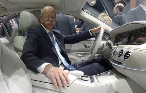 Dieter Zetsche, CEO of German carmaker Daimler, poses in a new Mercedes-Benz S-class car during a presentation in Hamburg, May 15, 2013. REU Dieter Zetsche, CEO of German carmaker Daimler, poses in a new Mercedes-Benz S-class car during a presentation in Hamburg, May 15, 2013. REU