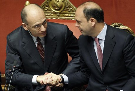 Italian Prime Minister Enrico Letta (L) shakes the hand of Italian Deputy Prime Minister and Interior Minister Angelino Alfano at the Upper Italian Prime Minister Enrico Letta (L) shakes the hand of Italian Deputy Prime Minister and Interior Minister Angelino Alfano at the Upper