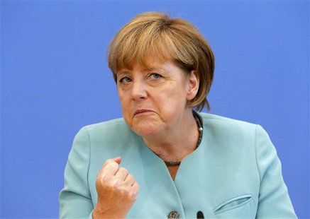 German Chancellor Angela Merkel gestures as she address media during a news conference at Bundespressekonferenz in Berlin July 19, 2013. REU German Chancellor Angela Merkel gestures as she address media during a news conference at Bundespressekonferenz in Berlin July 19, 2013. REU