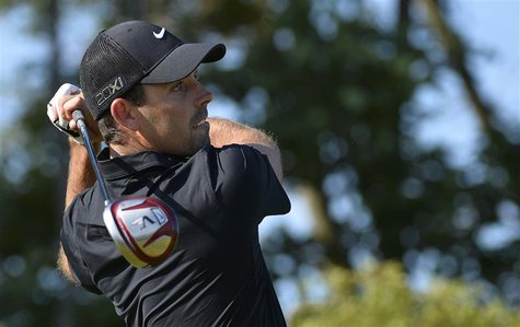 Charl Schwartzel of South Africa watches his tee shot on the second hole during the second round of the British Open golf Championship at Mu Charl Schwartzel of South Africa watches his tee shot on the second hole during the second round of the British Open golf Championship at Mu