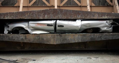 A vehicle is crushed at U.S. Auto Supply in Detroit, Michigan August 3, 2009. REUTERS/Rebecca Cook A vehicle is crushed at U.S. Auto Supply in Detroit, Michigan August 3, 2009. REUTERS/Rebecca Cook