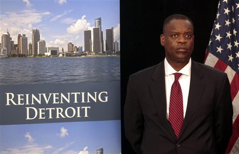 Detroit Emergency Manager Kevyn Orr waits to address the media during a news conference about filing bankruptcy for the city of Detroit in D Detroit Emergency Manager Kevyn Orr waits to address the media during a news conference about filing bankruptcy for the city of Detroit in D