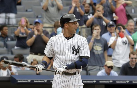 New York Yankees batter Derek Jeter stands at the plate for his first at-bat against the Kansas City Royals in the first inning of their MLB New York Yankees batter Derek Jeter stands at the plate for his first at-bat against the Kansas City Royals in the first inning of their MLB