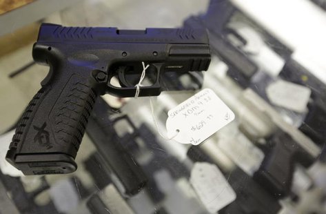 A hand gun, very similar to the gun used by alleged gunman Wade Michael Page, is seen at The Shooter Shop, where Page purchased the weapon, A hand gun, very similar to the gun used by alleged gunman Wade Michael Page, is seen at The Shooter Shop, where Page purchased the weapon,