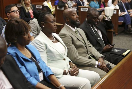 Trayvon Martin's parents Sybrina Fulton and Tracy Martin sit in court as Judge Debra Nelson reads instructions to the jury during George Zim Trayvon Martin's parents Sybrina Fulton and Tracy Martin sit in court as Judge Debra Nelson reads instructions to the jury during George Zim