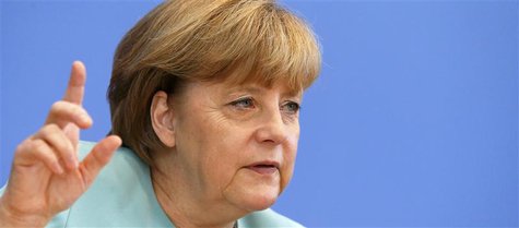 German Chancellor Angela Merkel gestures during a news conference at Bundespressekonferenz in Berlin July 19, 2013. REUTERS/Tobias Schwarz German Chancellor Angela Merkel gestures during a news conference at Bundespressekonferenz in Berlin July 19, 2013. REUTERS/Tobias Schwarz