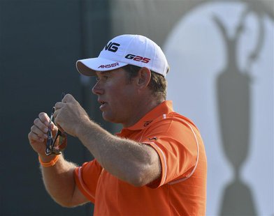 Lee Westwood of England walks off the 18th green after finishing his third round of the British Open golf Championship at Muirfield in Scotl Lee Westwood of England walks off the 18th green after finishing his third round of the British Open golf Championship at Muirfield in Scotl