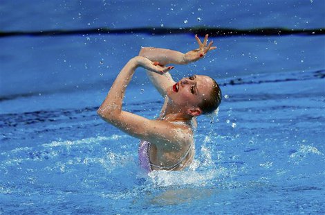 Russia's Svetlana Romashina performs in the synchronised swimming solo technical routine final during the World Swimming Championships at th Russia's Svetlana Romashina performs in the synchronised swimming solo technical routine final during the World Swimming Championships at th
