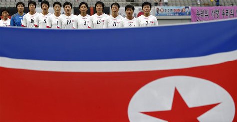 North Korea's national soccer team players sing their national anthem before the Women's East Asian Cup soccer championship match against So North Korea's national soccer team players sing their national anthem before the Women's East Asian Cup soccer championship match against So