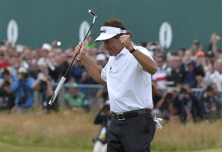 Phil Mickelson of the U.S. celebrates after sinking a birdie putt on the 18th green during the final round of the British Open golf champion Phil Mickelson of the U.S. celebrates after sinking a birdie putt on the 18th green during the final round of the British Open golf champion