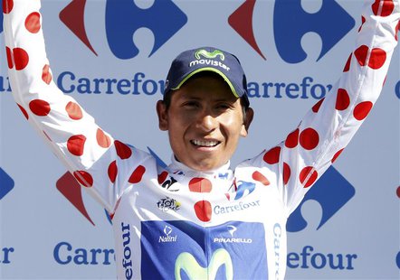 Movistar team rider Nairo Alexander Quintana of Colombia celebrates his best climber jersey on the podium of the 125 km stage of the centena Movistar team rider Nairo Alexander Quintana of Colombia celebrates his best climber jersey on the podium of the 125 km stage of the centena