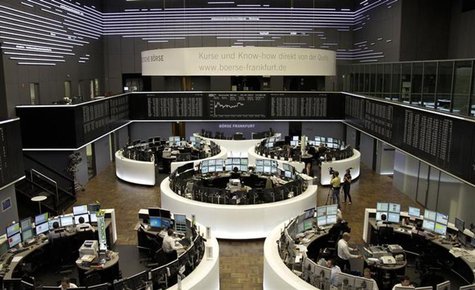 Traders are pictured at their desks in front of the DAX board at the Frankfurt stock exchange July 4, 2013. REUTERS/Remote/Pawel Kopczynski Traders are pictured at their desks in front of the DAX board at the Frankfurt stock exchange July 4, 2013. REUTERS/Remote/Pawel Kopczynski