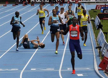 David Rudisha of Kenya (R) wins the men's 800 meters final as Erik Sowiniski of the U.S. (2nd L) falls to the track at the Diamond League Ad David Rudisha of Kenya (R) wins the men's 800 meters final as Erik Sowiniski of the U.S. (2nd L) falls to the track at the Diamond League Ad