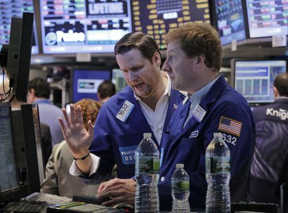 Traders work on the floor of the New York Stock Exchange following its reopening, October 31, 2012. REUTERS/Brendan McDermid Traders work on the floor of the New York Stock Exchange following its reopening, October 31, 2012. REUTERS/Brendan McDermid