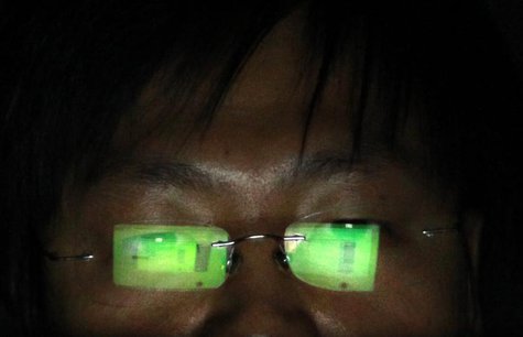 A hacker, who requests not to have his name revealed, works on his laptop in his office in Taipei July 10, 2013. REUTERS/Pichi Chuang A hacker, who requests not to have his name revealed, works on his laptop in his office in Taipei July 10, 2013. REUTERS/Pichi Chuang