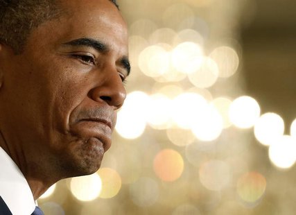 U.S. President Barack Obama pauses as he speaks about the benefits of the Affordable Care Act while in the East Room at the White House in W U.S. President Barack Obama pauses as he speaks about the benefits of the Affordable Care Act while in the East Room at the White House in W