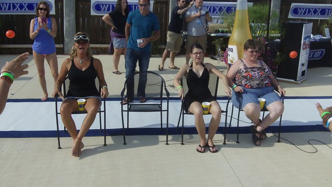 Round 2 of the "Balls in her Box" (or "Cup") game! The contestants really got into it!