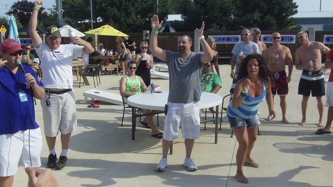 Photos from the "Balls in her Box" (or "Cup") game! The contestants really got into it!