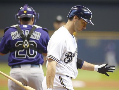 Milwaukee Brewers left fielder Ryan Braun (R) strikes out against the Colorado Rockies during the first inning in an MLB National League bas Milwaukee Brewers left fielder Ryan Braun (R) strikes out against the Colorado Rockies during the first inning in an MLB National League bas