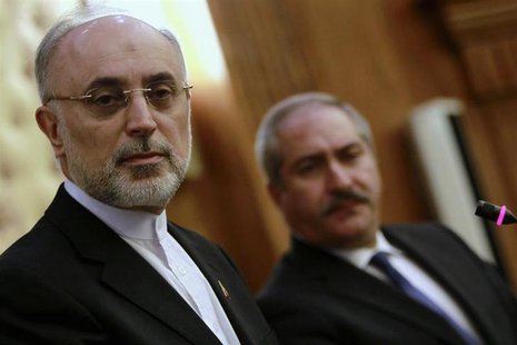 Iran's Foreign Minister Ali Akbar Salehi (L) and his Jordanian counterpart Nasser Judeh listen to a journalist during their joint news confe Iran's Foreign Minister Ali Akbar Salehi (L) and his Jordanian counterpart Nasser Judeh listen to a journalist during their joint news confe