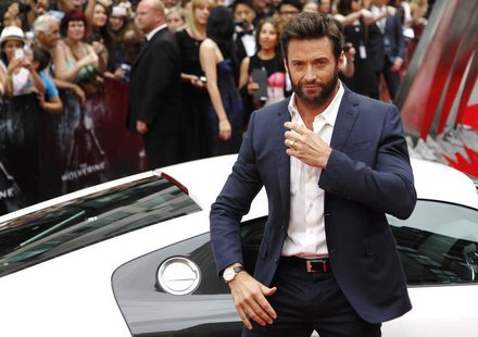 Actor Hugh Jackman poses as he arrives at the UK Premiere of "The Wolverine" at Leicester Square in London July 16, 2013. REUTERS/Luke MacGr Actor Hugh Jackman poses as he arrives at the UK Premiere of "The Wolverine" at Leicester Square in London July 16, 2013. REUTERS/Luke MacGr