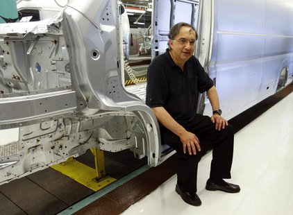 Fiat Chief Executive Sergio Marchionne poses during a visit at the carmaker's Sevelsud plant in Atessa, central Italy, July 9, 2013. REUTERS Fiat Chief Executive Sergio Marchionne poses during a visit at the carmaker's Sevelsud plant in Atessa, central Italy, July 9, 2013. REUTERS