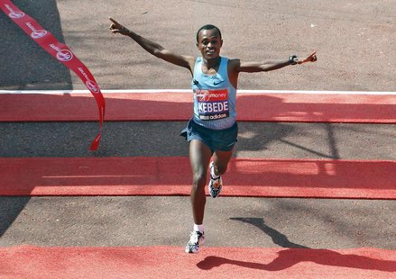 Tsegaye Kebede of Ethiopia wins the London Marathon on the Mall in central London, April 21, 2013. REUTERS/Andrew Winning Tsegaye Kebede of Ethiopia wins the London Marathon on the Mall in central London, April 21, 2013. REUTERS/Andrew Winning