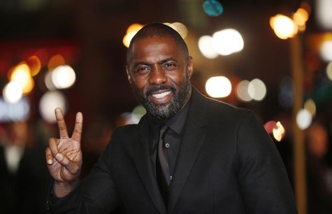 Actor Idris Elba gestures as he arrives for the world premiere of "Les Miserables" in London December 5, 2012. REUTERS/Suzanne Plunkett Actor Idris Elba gestures as he arrives for the world premiere of "Les Miserables" in London December 5, 2012. REUTERS/Suzanne Plunkett