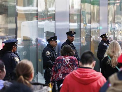 New York Police Department officers stand in the Times Square in New York, April 25, 2013. REUTERS/Brendan McDermid New York Police Department officers stand in the Times Square in New York, April 25, 2013. REUTERS/Brendan McDermid