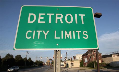 A 'Detroit City Limits' border sign is seen as traffic enters a westside neighborhood in Detroit, Michigan July 22, 2013. Picture taken July A 'Detroit City Limits' border sign is seen as traffic enters a westside neighborhood in Detroit, Michigan July 22, 2013. Picture taken July