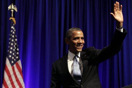 U.S. President Barack Obama waves after delivering remarks at an Organizing for Action dinner in Washington July 22, 2013. REUTERS/Yuri Grip U.S. President Barack Obama waves after delivering remarks at an Organizing for Action dinner in Washington July 22, 2013. REUTERS/Yuri Grip