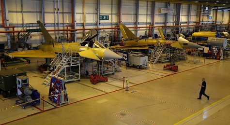 A worker crosses the floor of the Eurofighter Typhoon production line at BAE systems Warton plant near Preston, northern England September 7 A worker crosses the floor of the Eurofighter Typhoon production line at BAE systems Warton plant near Preston, northern England September 7