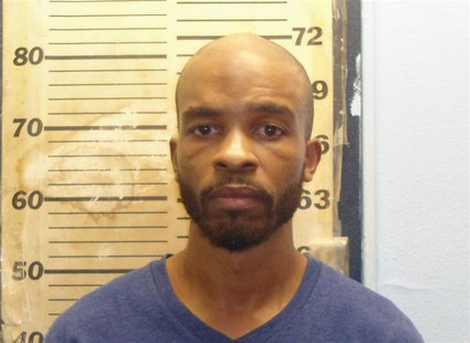Michael Madison, 35, is pictured in this East Cleveland Police Department booking photo released on July 23, 2013. REUTERS/East Cleveland Po Michael Madison, 35, is pictured in this East Cleveland Police Department booking photo released on July 23, 2013. REUTERS/East Cleveland Po