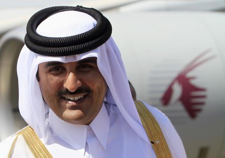 Qatar's Crown Prince Sheikh Tamim Bin Hamad Al Thani smiles during his arrival for an economic ties visit at Khartoum Airport December 4, 20 Qatar's Crown Prince Sheikh Tamim Bin Hamad Al Thani smiles during his arrival for an economic ties visit at Khartoum Airport December 4, 20