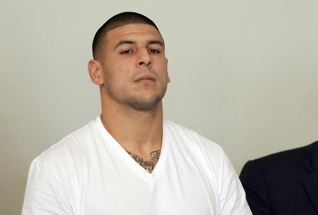 New England Patriots tight end Aaron Hernandez is arraigned on charges of murder and weapons violations in Attleborough, Massachusetts, afte New England Patriots tight end Aaron Hernandez is arraigned on charges of murder and weapons violations in Attleborough, Massachusetts, afte