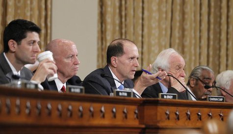U.S. House Ways and Means Committee Chairman Dave Camp (R-MI) questions outgoing acting IRS Commissioner Steven Miller (not pictured) during U.S. House Ways and Means Committee Chairman Dave Camp (R-MI) questions outgoing acting IRS Commissioner Steven Miller (not pictured) during