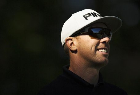 Hunter Mahan of the U.S. smiles on the eleventh tee during the pro-am at the Canadian Open golf tournament at the Glen Abbey Golf Club in Oa Hunter Mahan of the U.S. smiles on the eleventh tee during the pro-am at the Canadian Open golf tournament at the Glen Abbey Golf Club in Oa