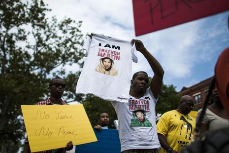 People take part in a march in support of Trayvon Martin's case in Harlem, New York, July 21, 2013. REUTERS/Eduardo Munoz People take part in a march in support of Trayvon Martin's case in Harlem, New York, July 21, 2013. REUTERS/Eduardo Munoz