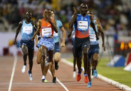 David Rudisha (R) of Kenya leads the men's 800m at the IAAF Diamond League athletics meet in Doha May 10, 2013 file photo. REUTERS/Fadi Al-A David Rudisha (R) of Kenya leads the men's 800m at the IAAF Diamond League athletics meet in Doha May 10, 2013 file photo. REUTERS/Fadi Al-A