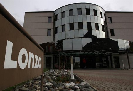 A logo of Swiss drug industry supplier Lonza is pictured outside the company's quarters in Visp October 31, 2012. REUTERS/Ruben Sprich A logo of Swiss drug industry supplier Lonza is pictured outside the company's quarters in Visp October 31, 2012. REUTERS/Ruben Sprich