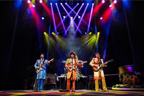 (L-R) James Fox, John Brosnan, and Reuven Gershon perform in the rock musical "Let it Be" on Broadway at the St. James Theater in New York i (L-R) James Fox, John Brosnan, and Reuven Gershon perform in the rock musical "Let it Be" on Broadway at the St. James Theater in New York i