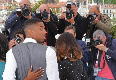 Director Ryan Coogler (C) and cast members Octavia Spencer, (L) and Melonie Diaz pose during a photocall for the film 'Fruitvale Station' at Director Ryan Coogler (C) and cast members Octavia Spencer, (L) and Melonie Diaz pose during a photocall for the film 'Fruitvale Station' at