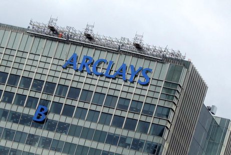 The letter "B" of the signage on the Barclays headquarters in Canary Wharf is hoisted up the side of the building in London July 20, 2012. R The letter "B" of the signage on the Barclays headquarters in Canary Wharf is hoisted up the side of the building in London July 20, 2012. R