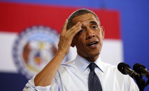 U.S. President Barack Obama wipes his brow while speaking in a hot room about the economy during a trip to the University of Central Missour U.S. President Barack Obama wipes his brow while speaking in a hot room about the economy during a trip to the University of Central Missour