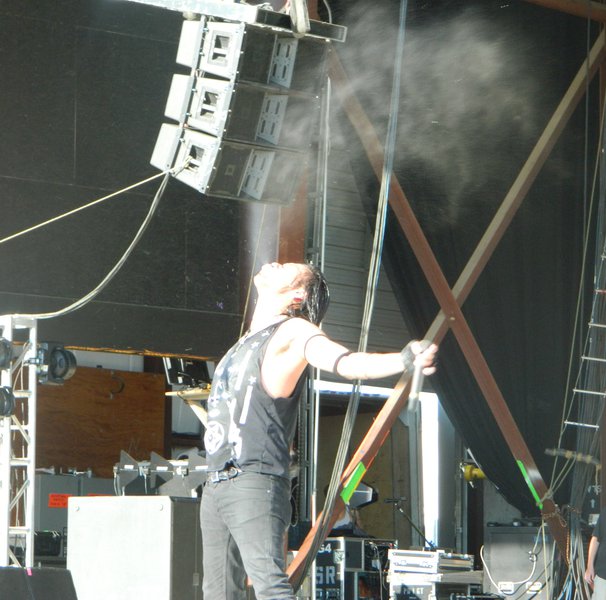 #3 - Leigh from Pop Evil was all over the stage, the picture line, the seats, and even directed the on-site camera team...he really needed that water