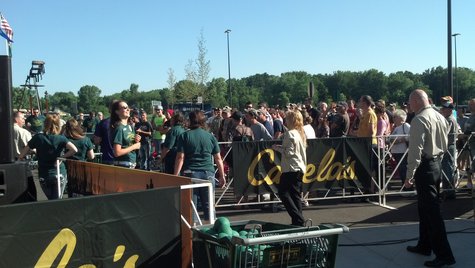 Customers line up outside the new Cabela's store in Ashwaubenon on July 25, 2013. (Photo by: Jeff Flynt). Customers line up outside the new Cabela's store in Ashwaubenon on July 25, 2013. (Photo by: Jeff Flynt).