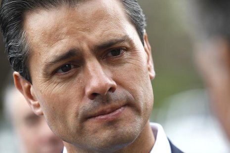Mexican President Enrique Pena Nieto listens to an attendee at the annual Allen and Co. conference at the Sun Valley, Idaho Resort July 11, Mexican President Enrique Pena Nieto listens to an attendee at the annual Allen and Co. conference at the Sun Valley, Idaho Resort July 11,