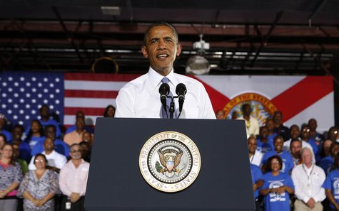 U.S. President Barack Obama speaks about the U.S. economy inside the main warehouse at the Jacksonville Port in Florida, July 25, 2013. REUT U.S. President Barack Obama speaks about the U.S. economy inside the main warehouse at the Jacksonville Port in Florida, July 25, 2013. REUT