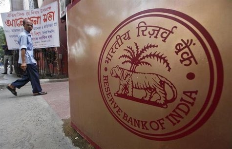 A man walks past a logo of the Reserve Bank of India (RBI) in front of its building in Kolkata May 21, 2012.REUTERS/Rupak De Chowdhuri A man walks past a logo of the Reserve Bank of India (RBI) in front of its building in Kolkata May 21, 2012.REUTERS/Rupak De Chowdhuri