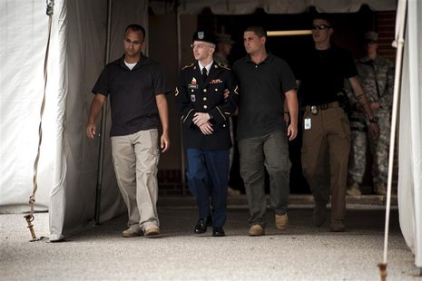 Private First Class Bradley Manning (C), 25, is escorted out of court after closing arguments in his military trial at Fort Meade, Maryland Private First Class Bradley Manning (C), 25, is escorted out of court after closing arguments in his military trial at Fort Meade, Maryland